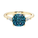 Cushion cut 3 stone engagement ring with soft corners and vintage charm.