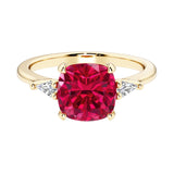 Cushion cut 3 stone engagement ring with soft corners and vintage charm.