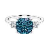 Cushion shaped engagement ring with brilliant diamonds and real alexandrite gemstone.