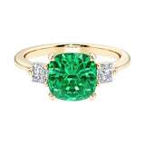 Cushion cut 3 stone engagement ring with soft corners and vintage charm.