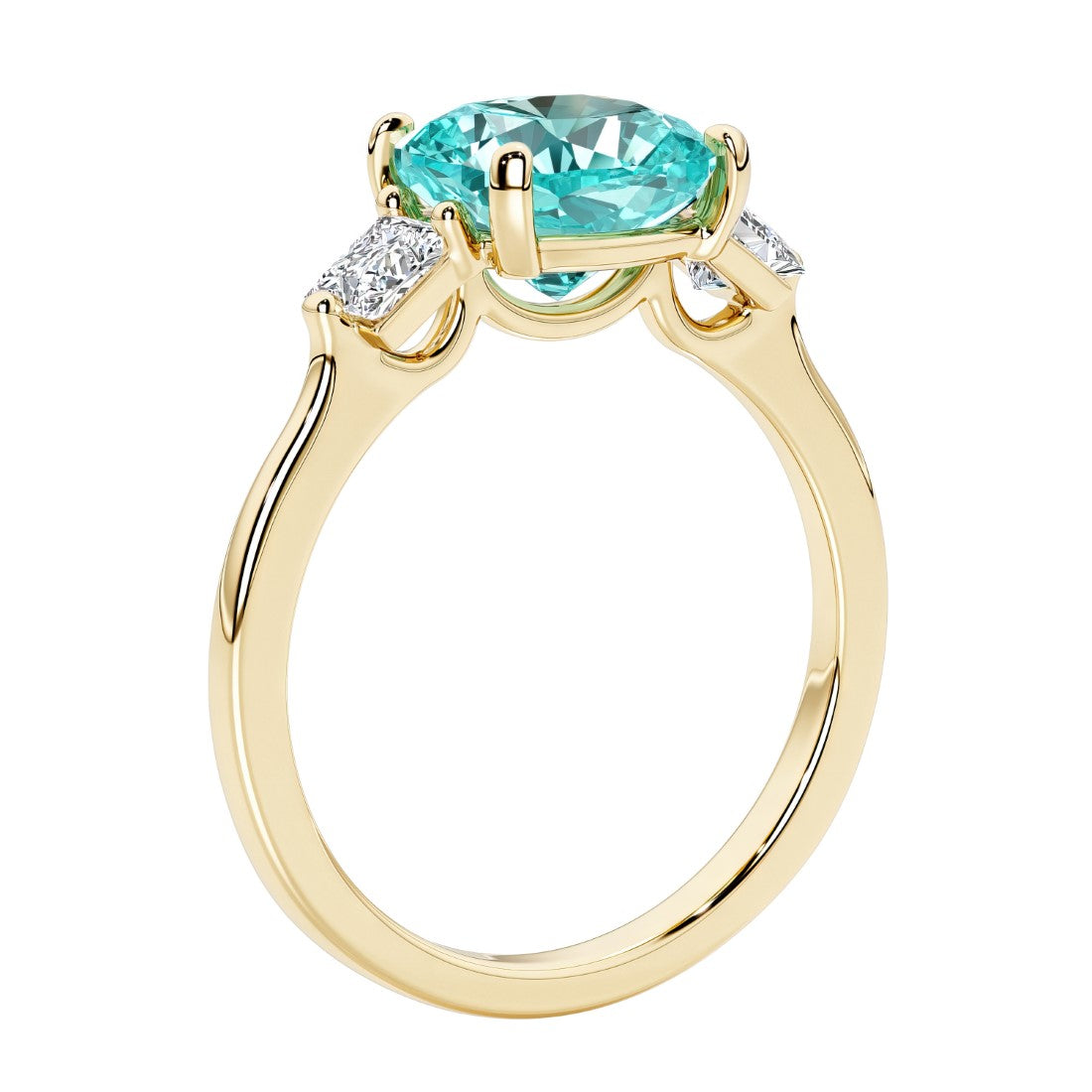 Three stone cushion diamond ring in yellow gold setting with green gemstone and diamonds.