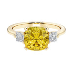 Cushion cut 3 stone engagement ring with soft corners and vintage charm.