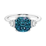 Cushion shaped engagement ring with brilliant diamonds and alexandrite gemstone.