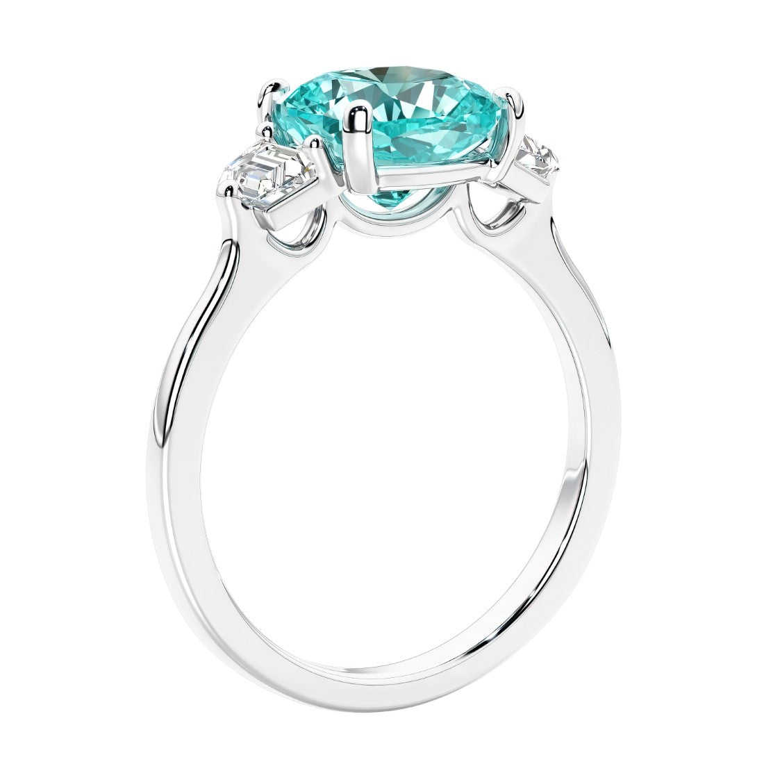 Cushion cut diamond ring as a unique engagement ring featuring three stone design with green gemstone and diamonds.