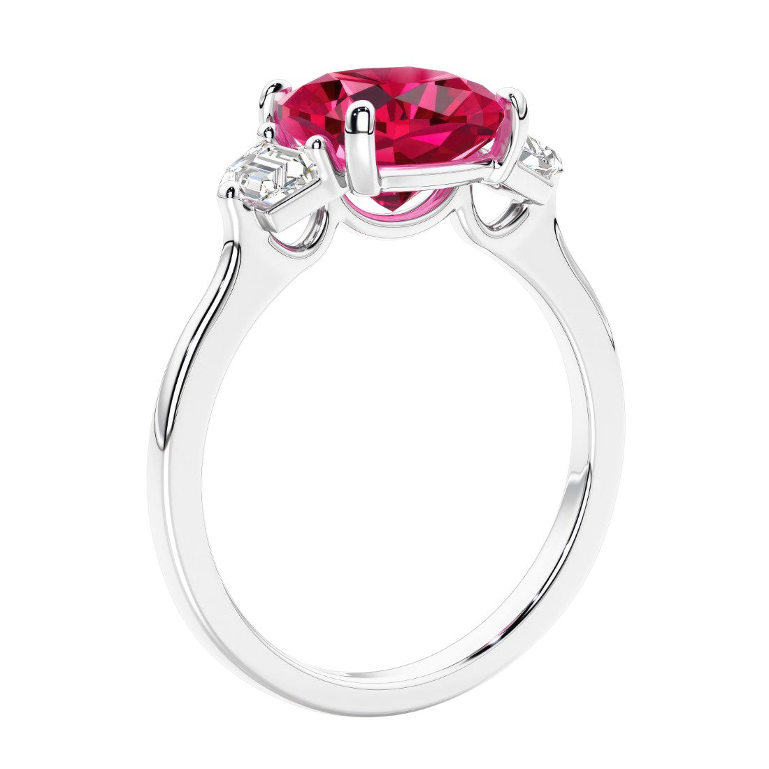 Cushion cut diamond ring as a unique engagement ring featuring three stone design with red gemstone and diamonds.