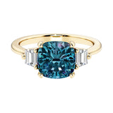 Cushion cut 3 stone engagement ring with soft corners and vintage charm.