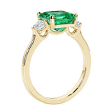 3 stone Asscher cut gemstone diamond ring in a classic Art Deco style.