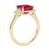 3 stone Asscher cut gemstone diamond ring in a classic Art Deco style.