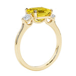 3 stone Asscher cut gemstone diamond ring in a classic Art Deco style.