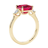 3 stone Asscher cut gemstone diamond ring in a classic Art Deco style featuring a ruby center.