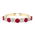 Ladies diamond anniversary bands featuring 9 sparkling diamonds in shared prong style.
