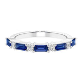 Ladies diamond anniversary band with nine stones, featuring a mix of gemstones and lab diamonds.