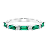 Ladies diamond anniversary band with nine stones, featuring a mix of gemstones and lab diamonds.