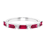 Ladies diamond anniversary band with nine stones, featuring a mix of gemstones and lab diamonds.