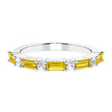 Ladies diamond anniversary band with nine stones, featuring a mix of gemstones and lab diamonds.