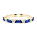 9 stone gemstone anniversary ring with alternating diamonds and gemstones in yellow gold.