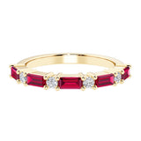 9 stone gemstone anniversary ring with alternating diamonds and gemstones in yellow gold.
