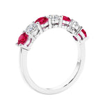 Anniversary diamond ring featuring 7 lab created diamonds and gemstones in a classic band.