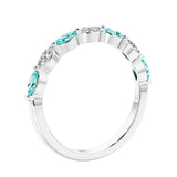 Anniversary diamond ring featuring 7 lab created diamonds and gemstones in a classic band.