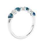 Anniversary diamond ring featuring 7 lab created diamonds and gemstones in a classic band.