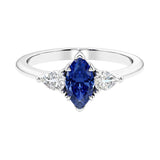 Three stone marquise diamond ring with dramatic center shape.