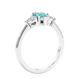 Marquise shaped engagement ring with diamonds in classic 3 stone ring setting.
