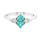 Three stone marquise diamond ring with dramatic center shape.