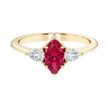 Marquise cut 3 stone engagement ring with elegant taper.