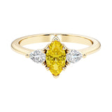 Marquise cut 3 stone engagement ring with elegant taper.