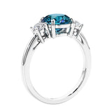 3 stone wedding ring featuring round center diamond and matching sides.