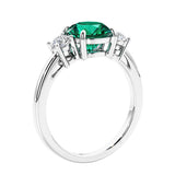 3 stone wedding ring featuring round center diamond and matching sides.