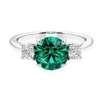 Timeless three stone round diamond engagement ring.