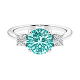Timeless three stone round diamond engagement ring.