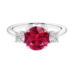 Timeless three stone round diamond engagement ring.