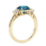 3 stone round diamond ring in classic yellow gold setting.