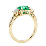 3 stone round diamond ring in classic yellow gold setting.