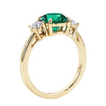 3 stone round diamond ring in classic yellow gold setting.