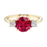 Three stone round engagement ring with brilliant cut diamonds.