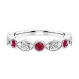 Elegant vintage-inspired anniversary ring featuring marquise ruby and diamonds in a 9 stone setting.