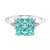 Nature inspired ringprincess cut paraiba tourmalines and brilliant round diamonds.