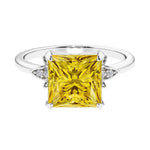 Nature inspired ringprincess cut yellow sapphires and brilliant round diamonds.