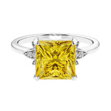Nature inspired ringprincess cut yellow sapphires and brilliant round diamonds.