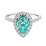 Halo ring with diamond french pave band.