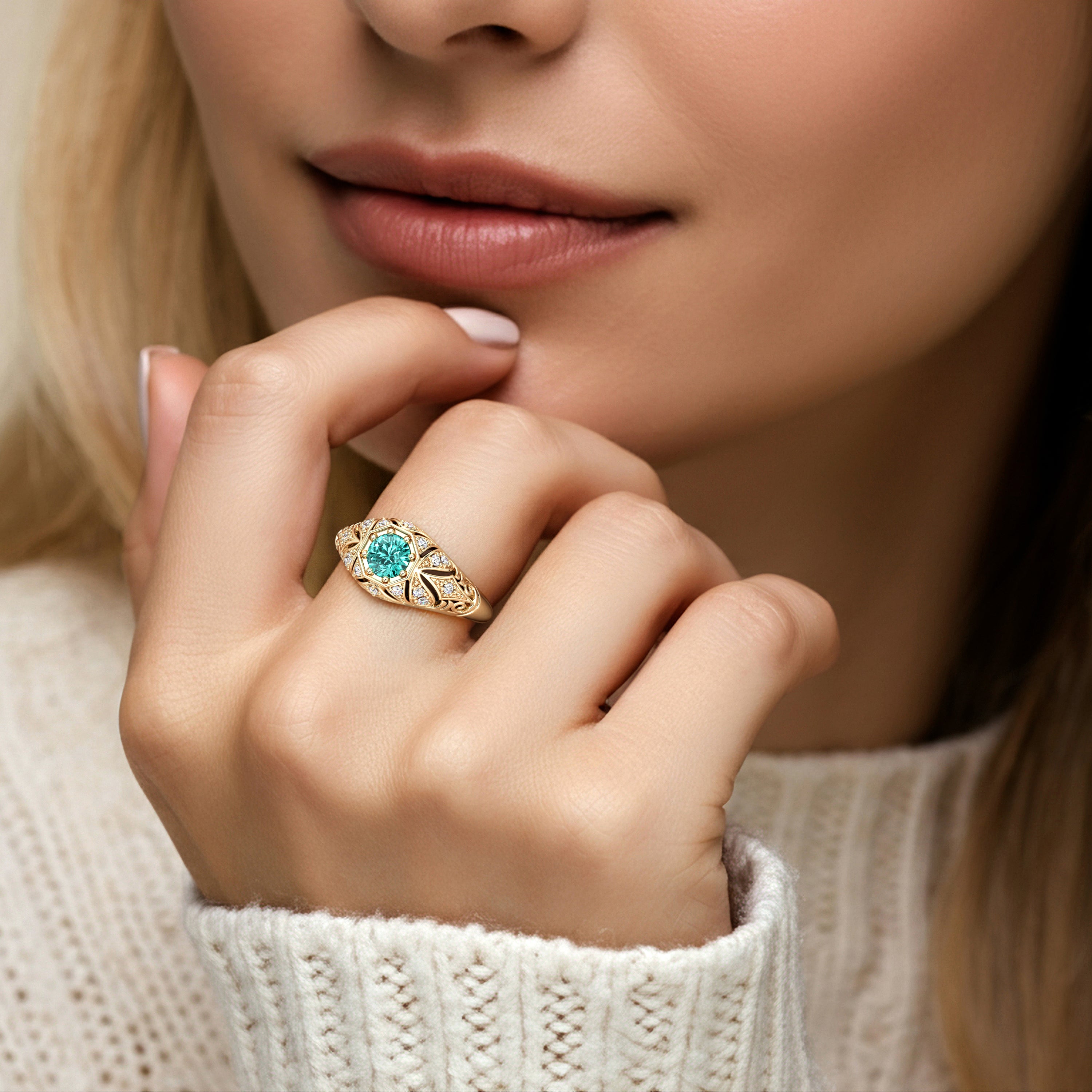 Custom yellow gold Paraiba tourmaline ring with diamond accents, handcrafted by Pel & Co.