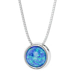 Round Blue Opal bezel set solitaire pendant in 14k white gold for women made in USA by Pel & Co Custom Jewelry