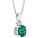 Handcrafted green emerald solitaire necklace in 14k white gold by Pel & Co