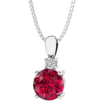 14k white gold solitaire pendant with a red ruby gemstone 