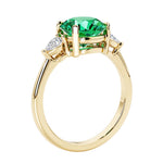 3 stone round diamond ring in classic 14k yellow gold setting.