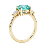 3 stone round diamond ring in classic 14k yellow gold setting.