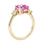 3 stone round diamond ring in classic 14k yellow gold setting.